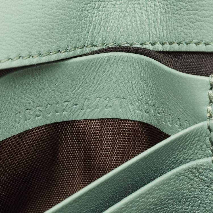 Pre Owned Fendi Green FF Logo Embossed Leather Mini Baguette Bag