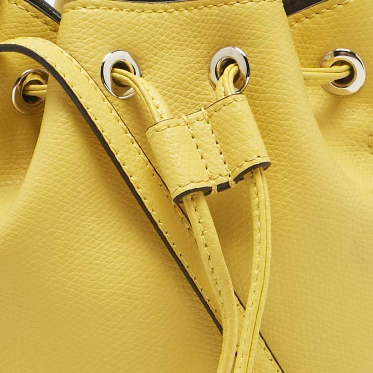 Pre Owned Fendi Yellow Leather Mini Mon Tresor Drawstring Bucket Bag