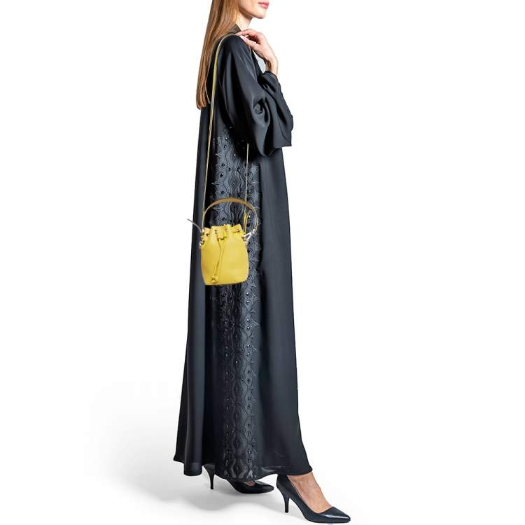 Pre Owned Fendi Yellow Leather Mini Mon Tresor Drawstring Bucket Bag