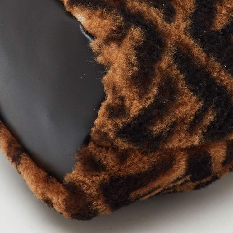 Pre Owned Fendi Brown Shearling Fur and Leather Mini Mon Tresor Drawstring Bucket Bag