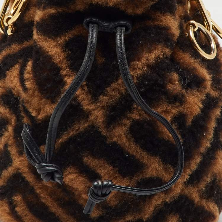 Pre Owned Fendi Brown Shearling Fur and Leather Mini Mon Tresor Drawstring Bucket Bag