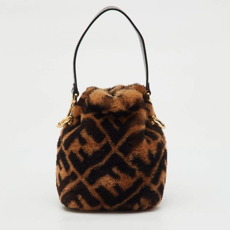 Pre Owned Fendi Brown Shearling Fur and Leather Mini Mon Tresor Drawstring Bucket Bag