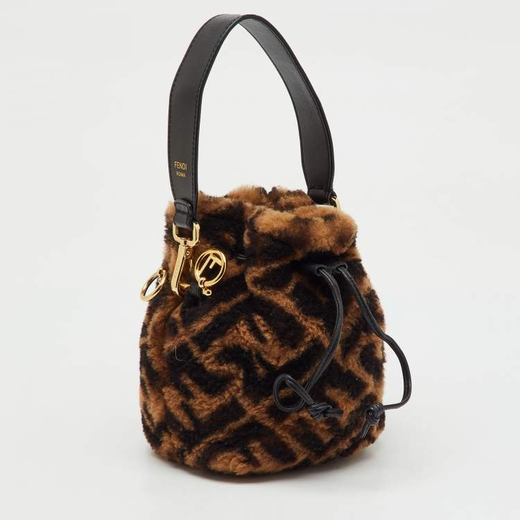 Pre Owned Fendi Brown Shearling Fur and Leather Mini Mon Tresor Drawstring Bucket Bag