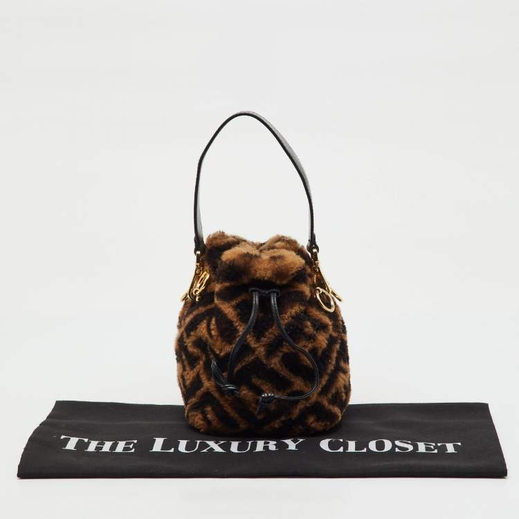 Pre Owned Fendi Brown Shearling Fur and Leather Mini Mon Tresor Drawstring Bucket Bag