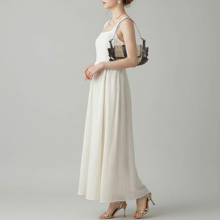 Pre Owned Fendi Compilation Baguette Brown/Beige Zucchino Canvas and Leather Bag