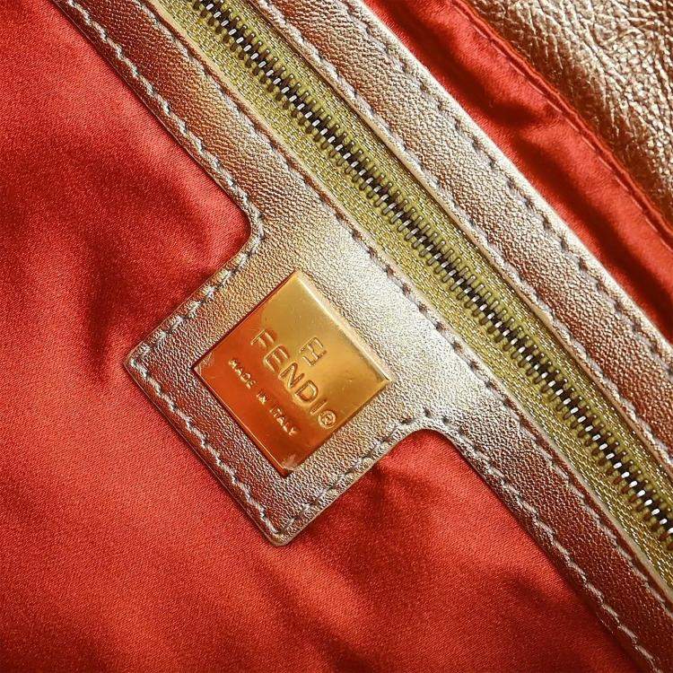 Pre Owned Fendi Gold Lambskin Mamma Baguette Handbag