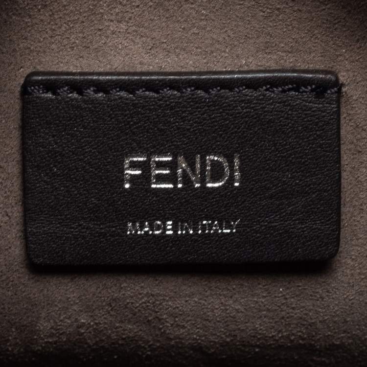 Pre Owned Fendi Beige/Red Monogram Embossed Leather Mini Mon Tresor Drawstring Bucket Bag
