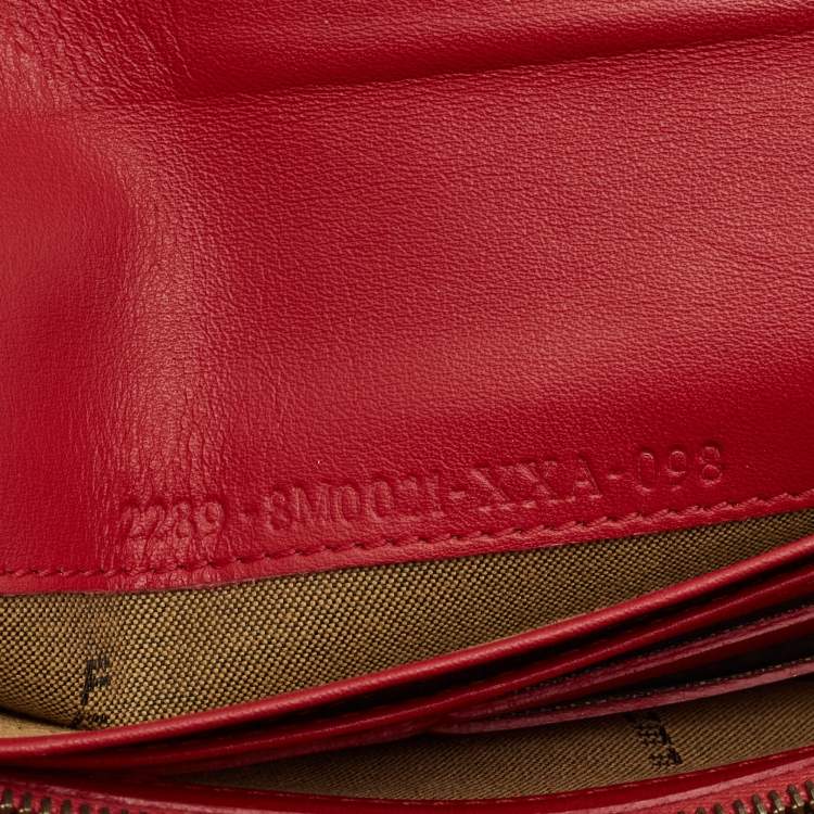 Pre Owned Fendi Orange Zucchino Patent Leather Mia Flap Continental Wallet