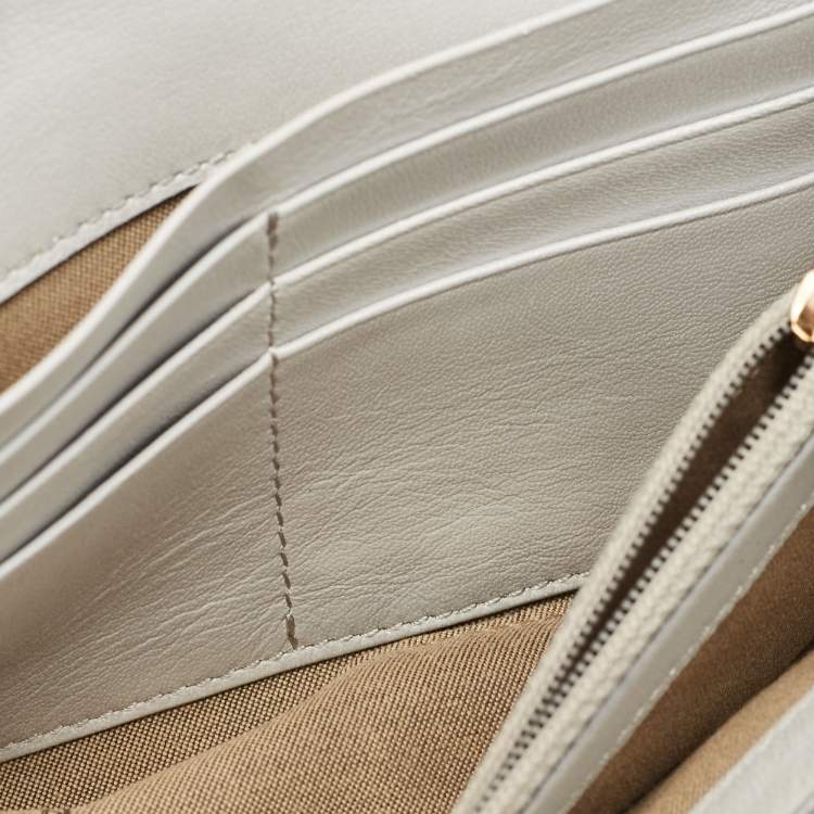 Pre Owned Fendi Silver Textured Leather Logo Flap Continental Wallet