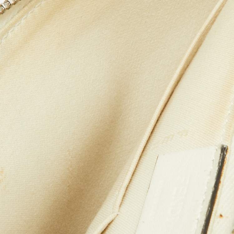 Pre Owned Fendi Off White/Brown Leather and Watersnake Leather Monster Eyes Zip Pouch