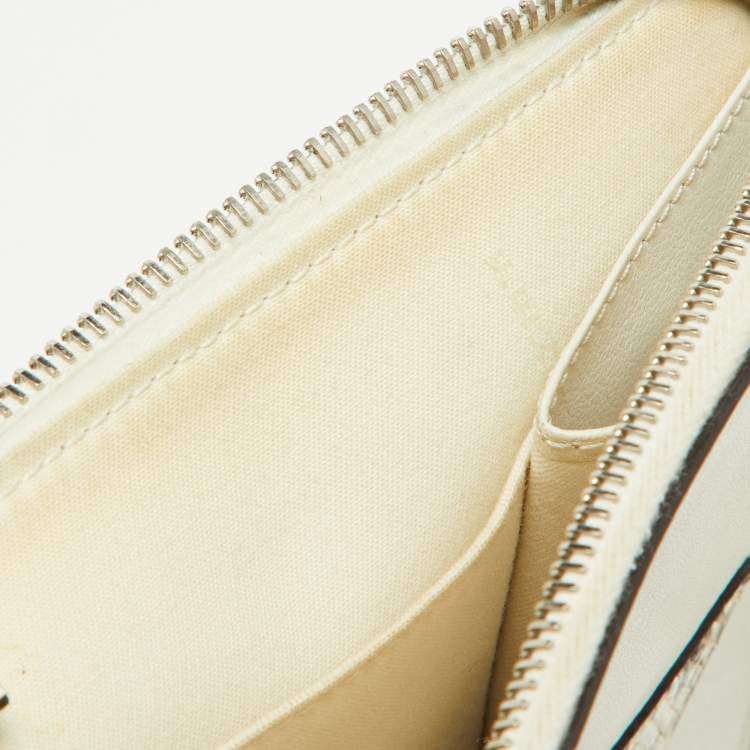 Pre Owned Fendi Off White/Brown Leather and Watersnake Leather Monster Eyes Zip Pouch