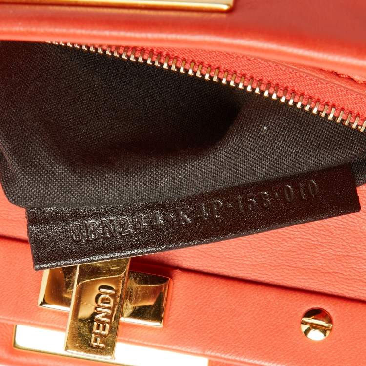 Pre Owned Fendi Orange Leather Mini Peekaboo Top Handle Bag