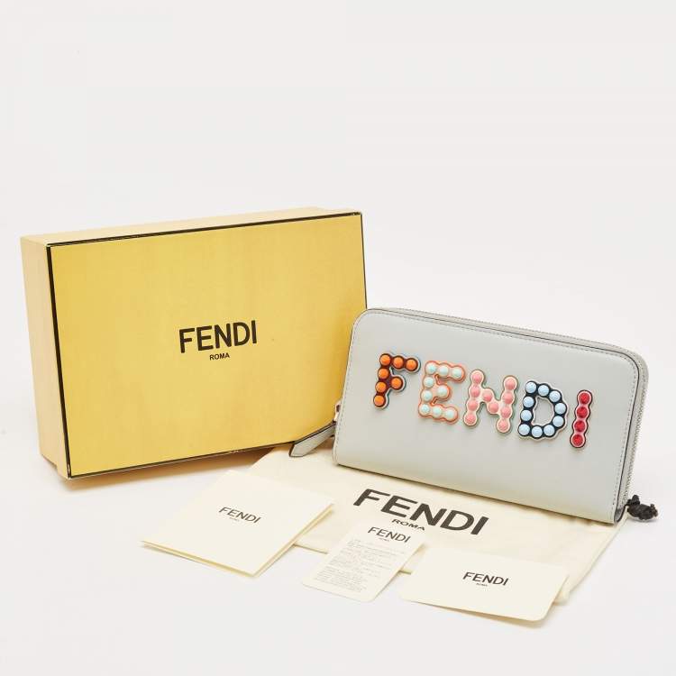 Pre Owned Fendi Grey Leather Logo Studded Zip Around Wallet 