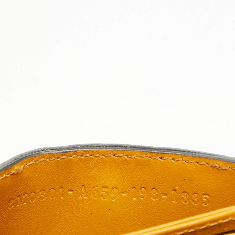 Pre Owned Fendi Tobacco/Yellow Zucca Embossed Leather FF Flap Wallet