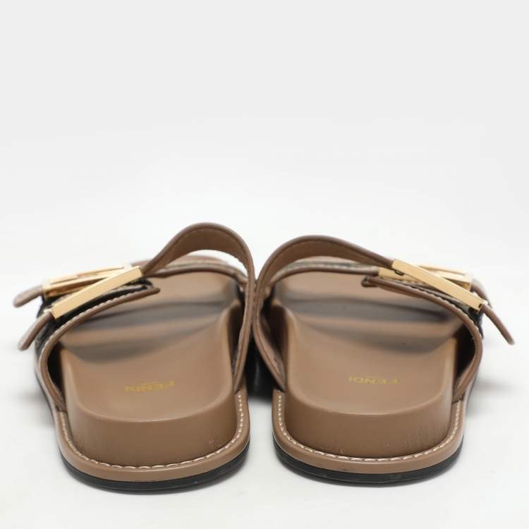 Pre Owned Fendi Brown/Beige Zucca Canvas and Leather FF Buckle Flat Slides Size 37
