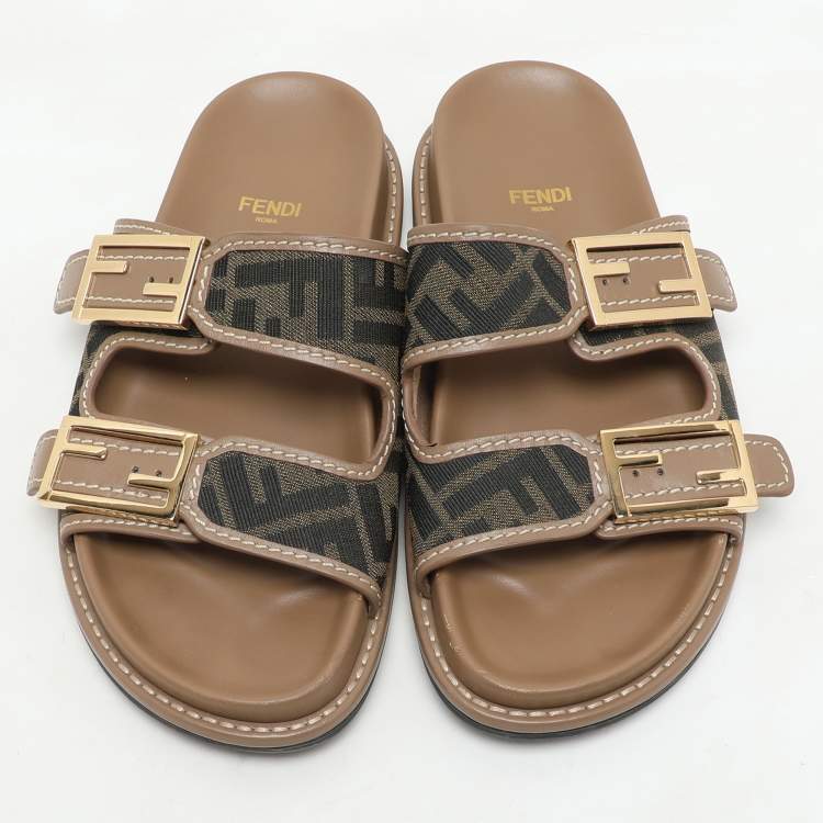 Pre Owned Fendi Brown/Beige Zucca Canvas and Leather FF Buckle Flat Slides Size 37