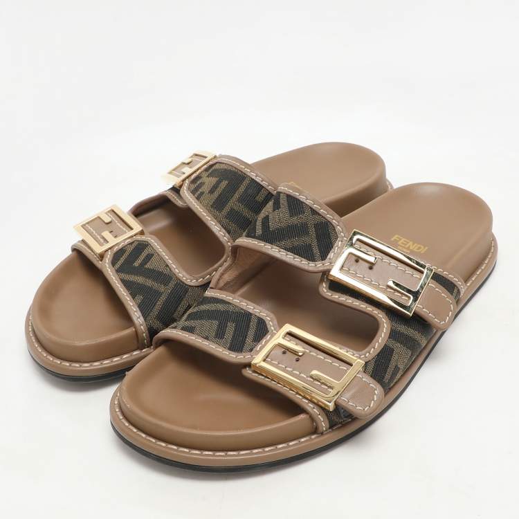 Pre Owned Fendi Brown/Beige Zucca Canvas and Leather FF Buckle Flat Slides Size 37