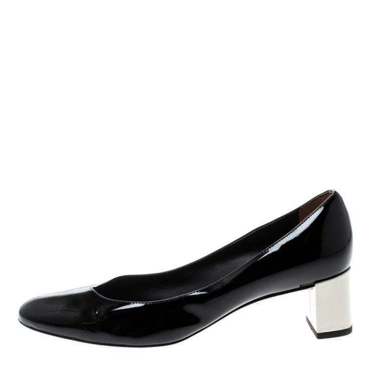 round toe patent pumps
