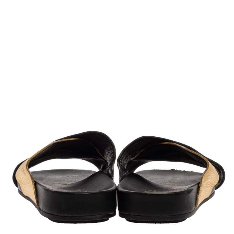 Pre Owned Fendi Gold Edition Black/Gold Leather Wave Pattern Flat Slides Size 39