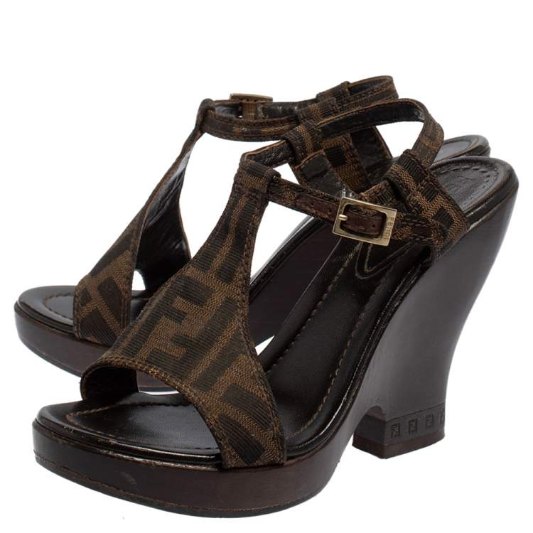 مملوكة مسبقًا Fendi Brown Zucca Canvas Wedges Ankle Strap Sandals 37.5