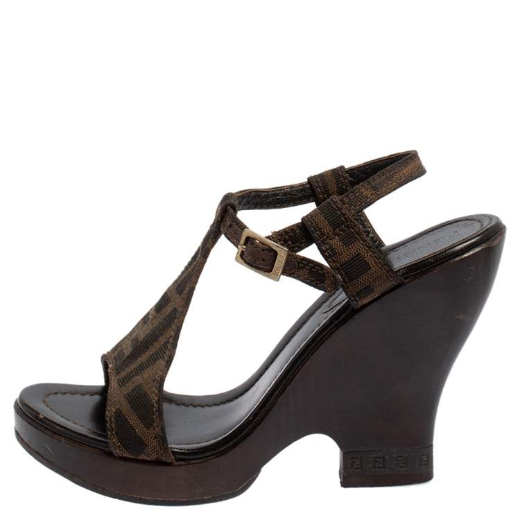 مملوكة مسبقًا Fendi Brown Zucca Canvas Wedges Ankle Strap Sandals 37.5