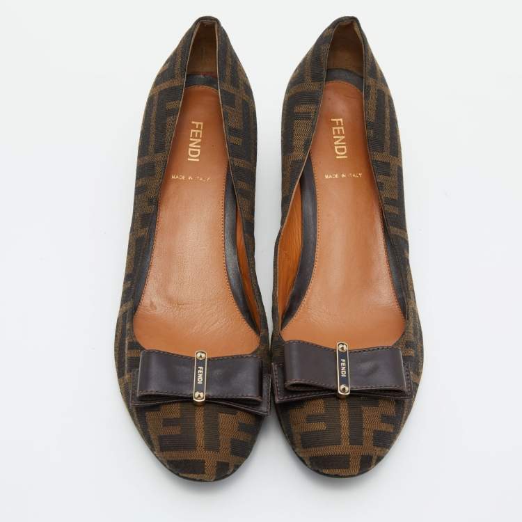 Pre Owned Fendi Tobacco Zucca Canvas and Leather Bow Round Toe Wedge Pumps Size 40.5