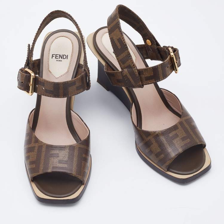مملوكة مسبقًا Fendi Brown Zucca Coated Canvas Motif Logo Wedge Ankle Strap Sandals Size 36.5