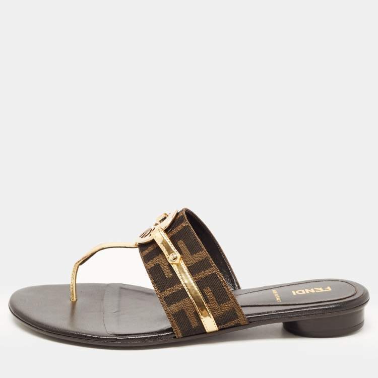 مملوكة مسبقًا Fendi Brown/Gold Zucca Canvas and Patent Leather Buckle Thong Slide Flats Size 39