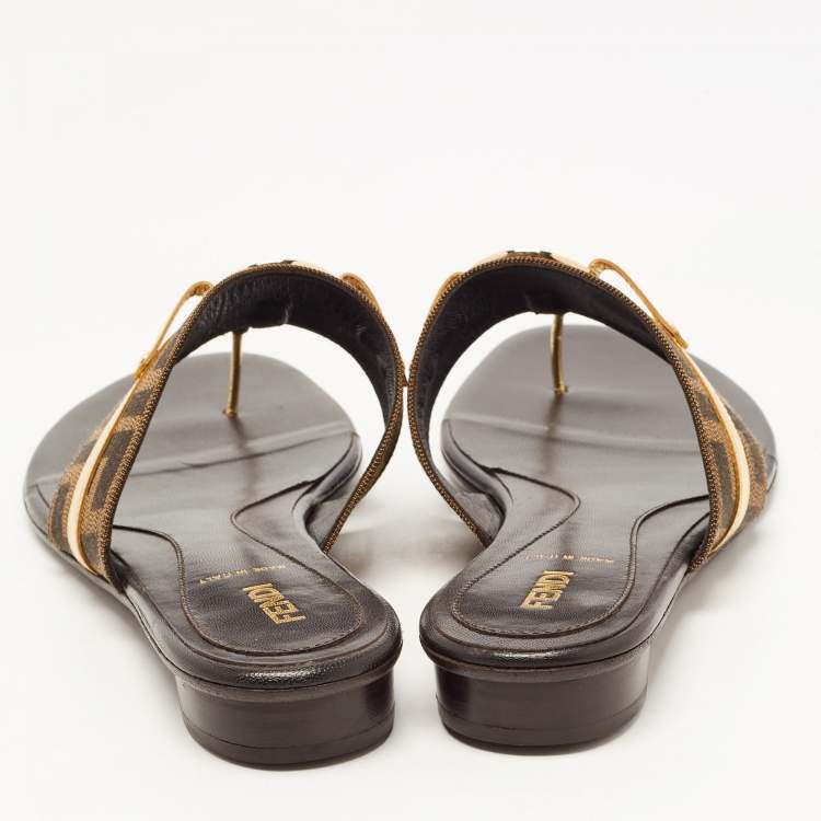 مملوكة مسبقًا Fendi Brown/Gold Zucca Canvas and Patent Leather Buckle Thong Slide Flats Size 39