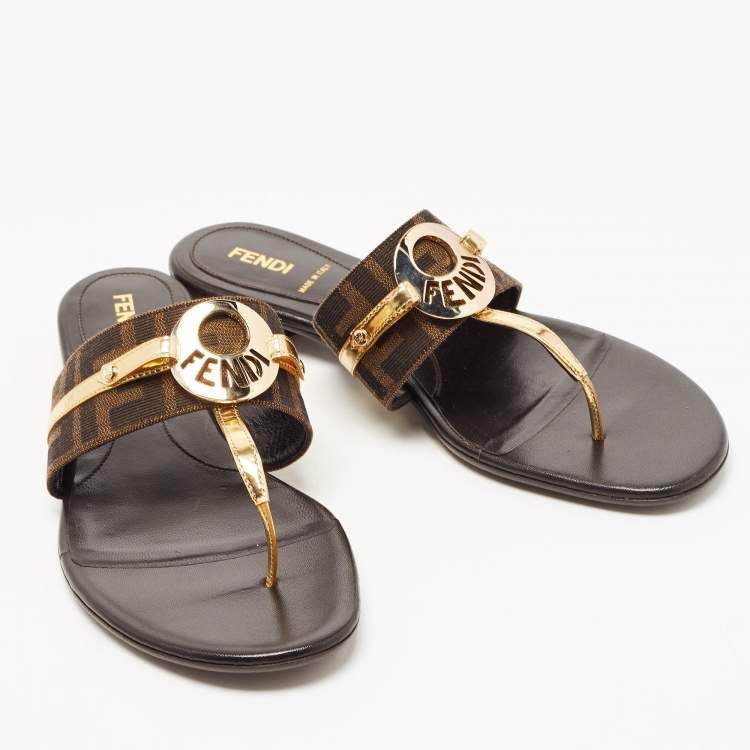 مملوكة مسبقًا Fendi Brown/Gold Zucca Canvas and Patent Leather Buckle Thong Slide Flats Size 39