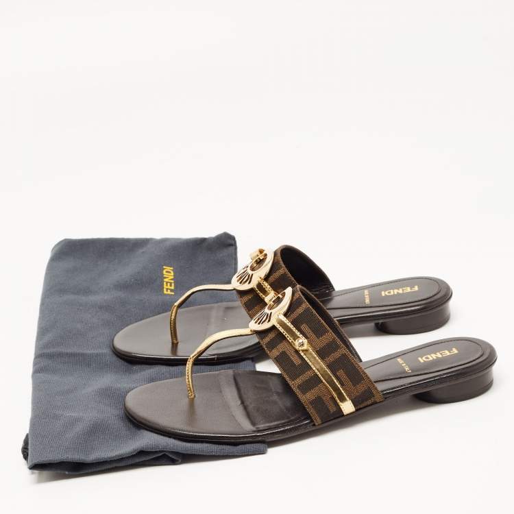 مملوكة مسبقًا Fendi Brown/Gold Zucca Canvas and Patent Leather Buckle Thong Slide Flats Size 39
