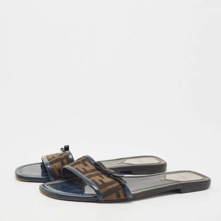 Pre Owned Fendi Brown/Navy Blue Zucca Canvas and Leather Bow Flat Slides Size 40