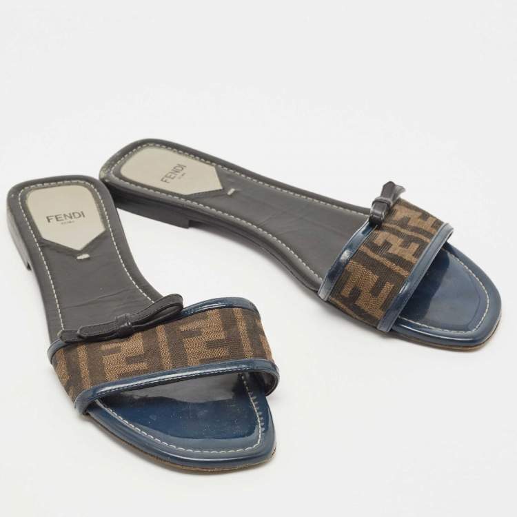 Pre Owned Fendi Brown/Navy Blue Zucca Canvas and Leather Bow Flat Slides Size 40