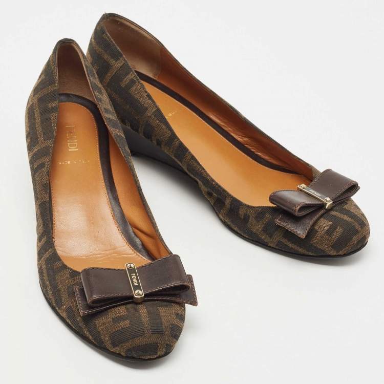 Pre Owned Fendi Brown Zucca Canvas and Leather Bow Round Toe Wedge Pumps Size 39