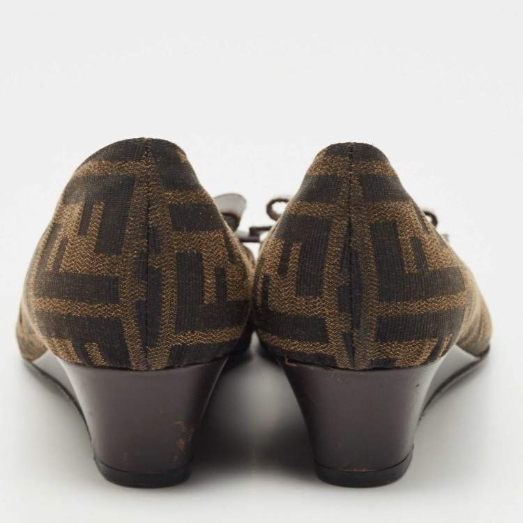 Pre Owned Fendi Brown Zucca Canvas and Leather Bow Round Toe Wedge Pumps Size 39