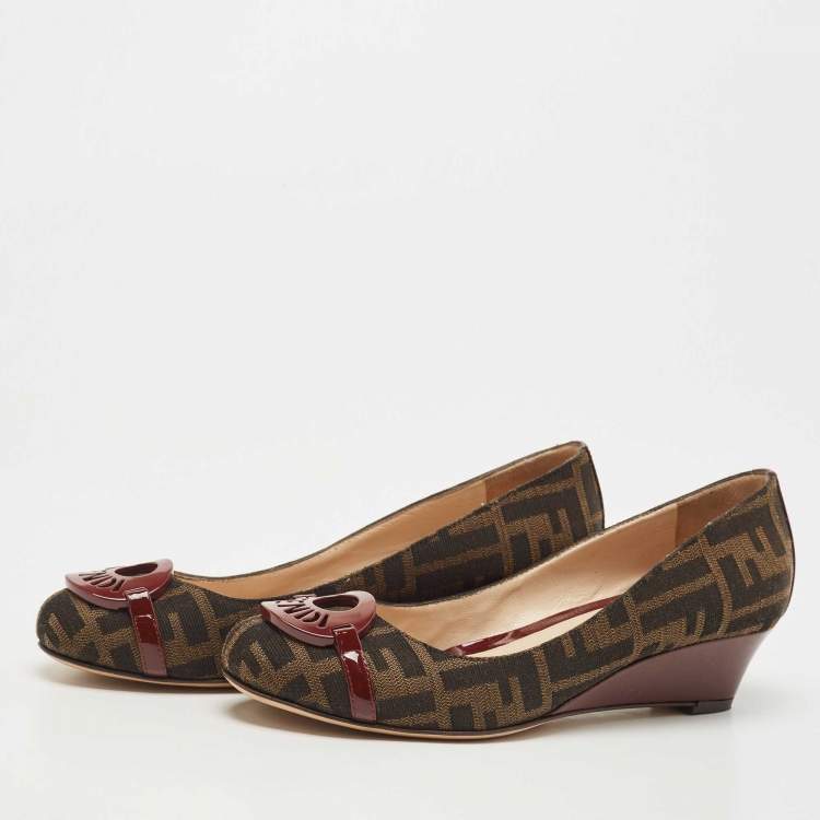 Pre Owned Fendi Burgundy/Brown Patent Leather and Tobacco Zucca Canvas Logo Plate Wedge Pumps Size 37.5