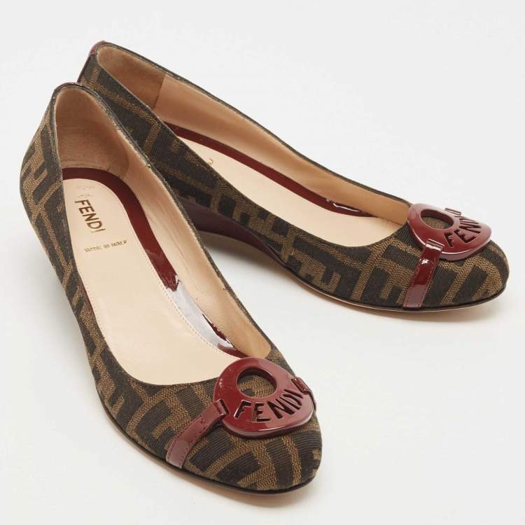 Pre Owned Fendi Burgundy/Brown Patent Leather and Tobacco Zucca Canvas Logo Plate Wedge Pumps Size 37.5