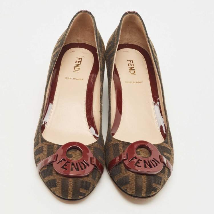 Pre Owned Fendi Burgundy/Brown Patent Leather and Tobacco Zucca Canvas Logo Plate Wedge Pumps Size 37.5