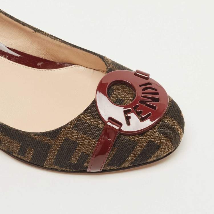 Pre Owned Fendi Burgundy/Brown Patent Leather and Tobacco Zucca Canvas Logo Plate Wedge Pumps Size 37.5