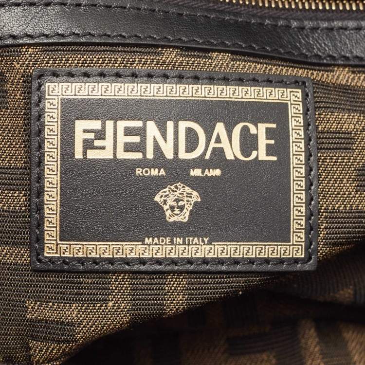 Pre Owned Fendi x Versace Fendace Blue/Black Denim and Leather Fendace Patchwork Baguette Bag