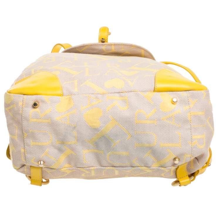 Pre Owned Furla Beige/Yellow Signature Canvas and Leather Flap Backpack