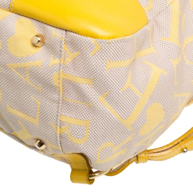Pre Owned Furla Beige/Yellow Signature Canvas and Leather Flap Backpack