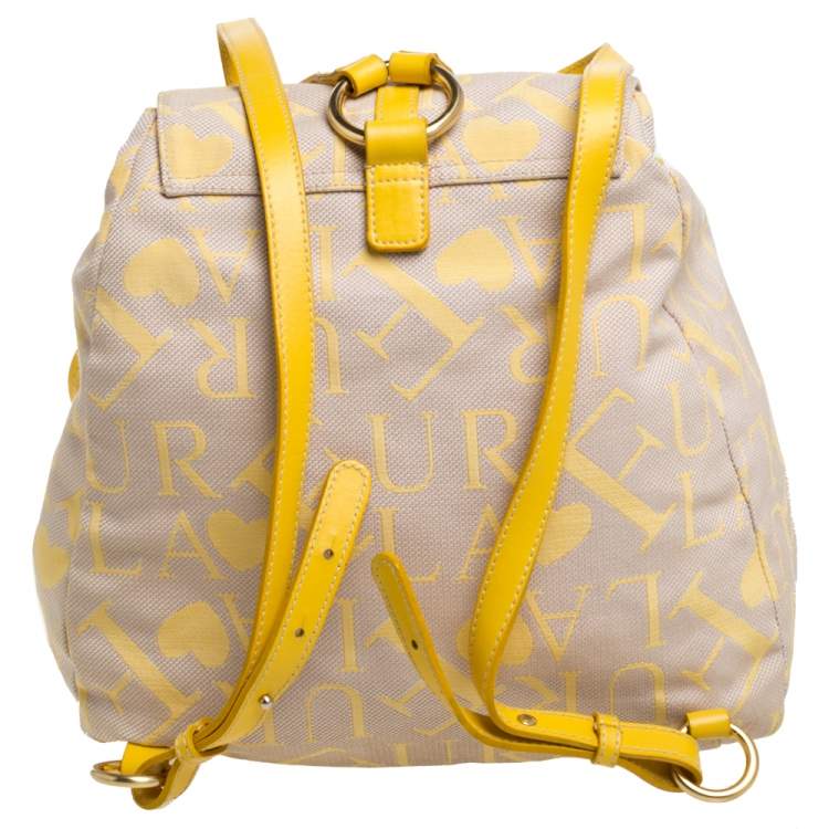 Pre Owned Furla Beige/Yellow Signature Canvas and Leather Flap Backpack