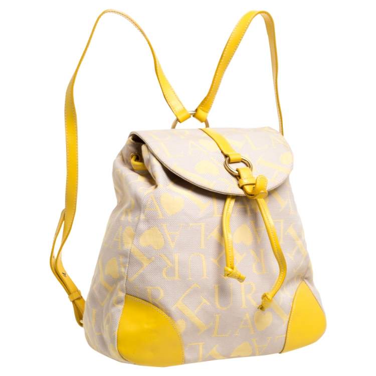 Pre Owned Furla Beige/Yellow Signature Canvas and Leather Flap Backpack