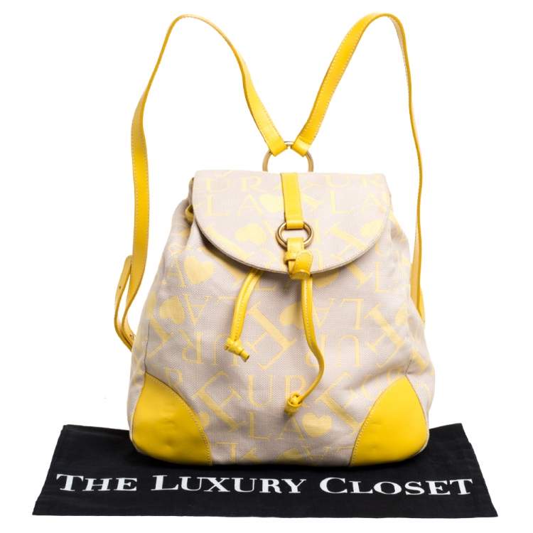 Pre Owned Furla Beige/Yellow Signature Canvas and Leather Flap Backpack