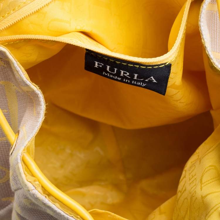 Pre Owned Furla Beige/Yellow Signature Canvas and Leather Flap Backpack