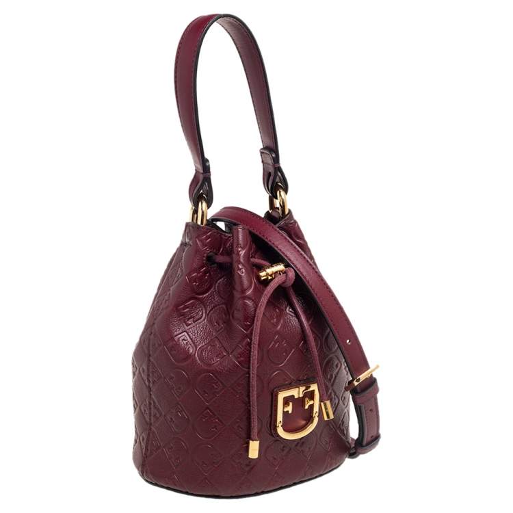 Pre Owned Furla Burgundy Embossed Leather Drawstring Corona Bucket Bag