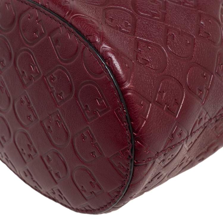 Pre Owned Furla Burgundy Embossed Leather Drawstring Corona Bucket Bag