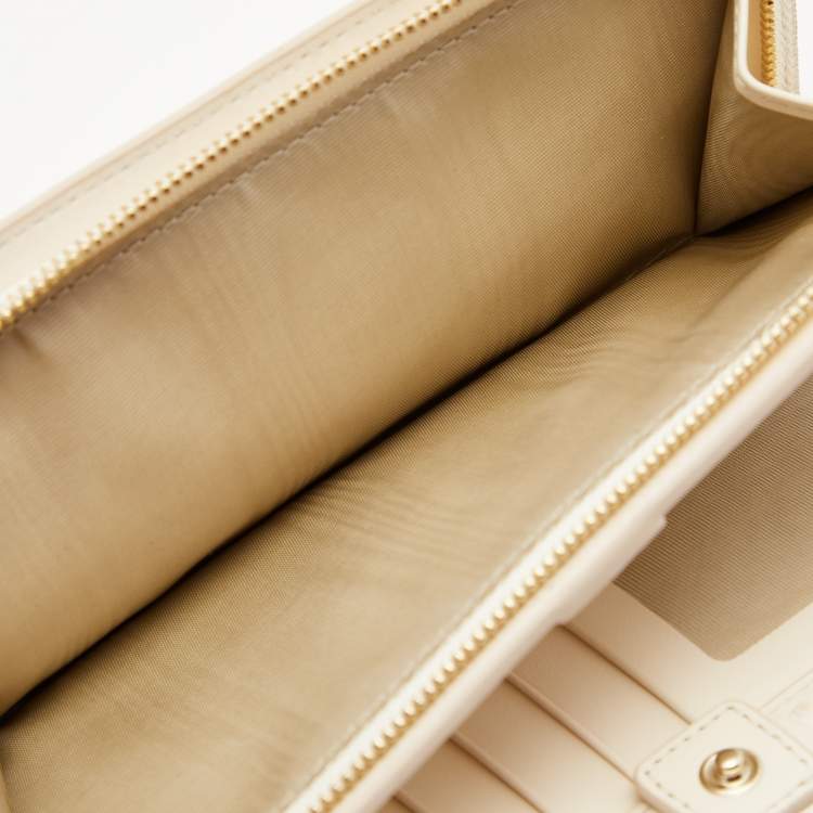 Pre Owned Furla Cream Ostrich Embossed Leather Continental Wallet