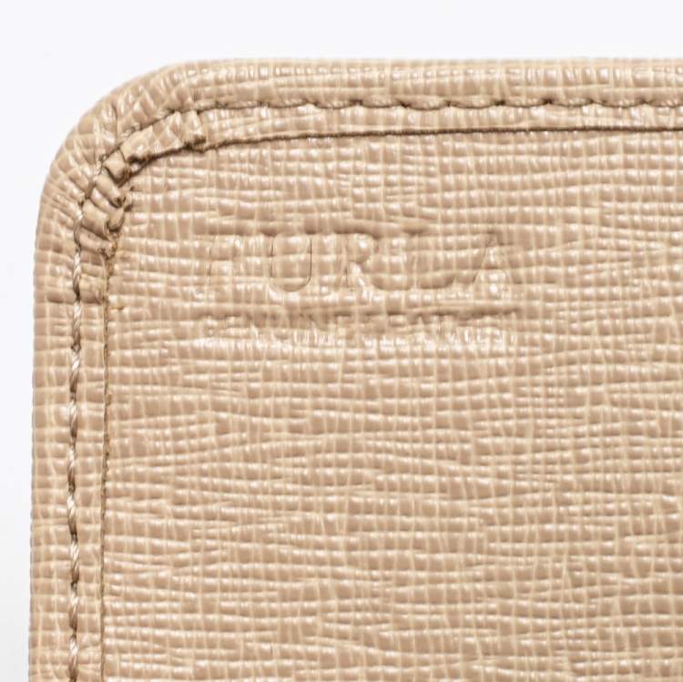 Pre Owned Furla Beige Leather Pushlock Flap Continental Wallet